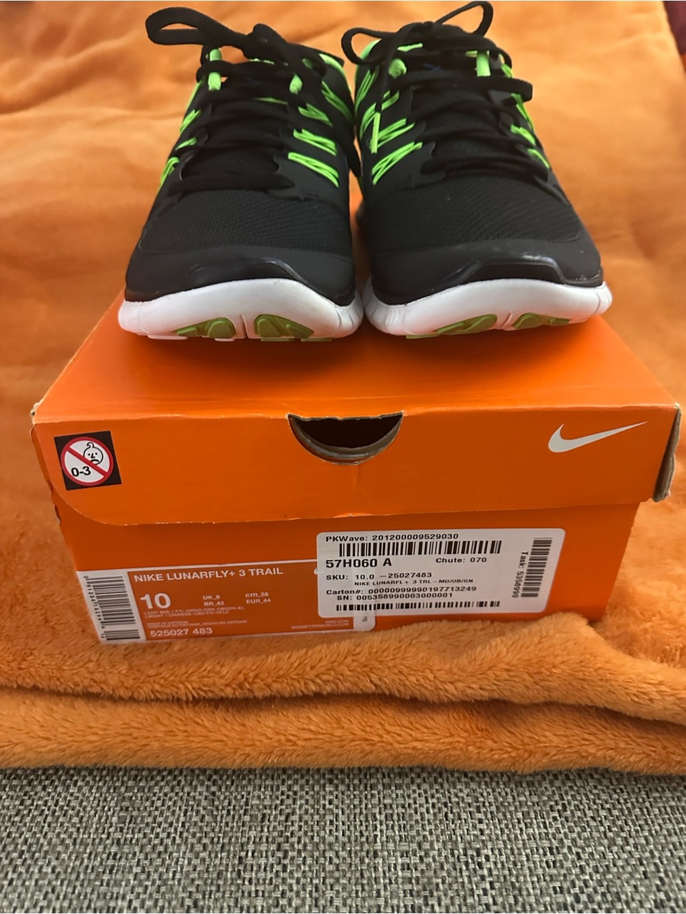 Nike Free 5.0+ men's running black with a blue swoosh and neon green size 10